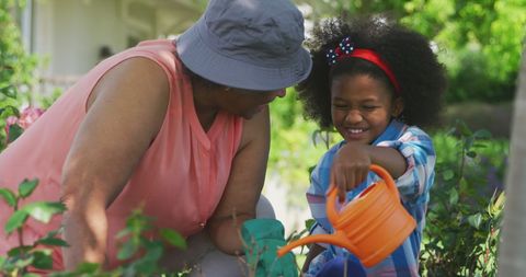 Grandmother Gardening Joyfully with Granddaughter