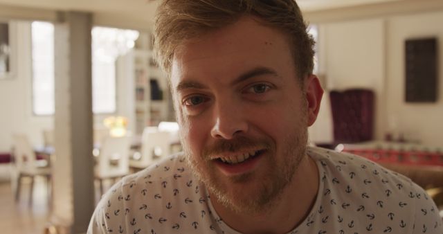 Close-Up of Smiling Young Man with Beard in Homely Setting - Download Free Stock Images Pikwizard.com