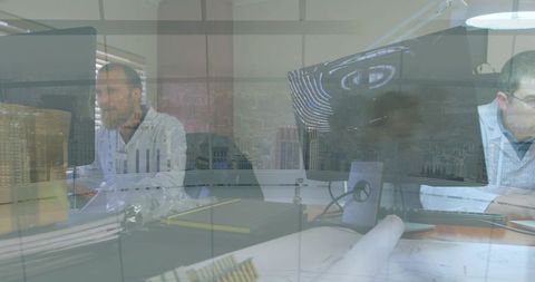 Architects collaborating over blueprints on curved monitors reflecting modern urban skyline