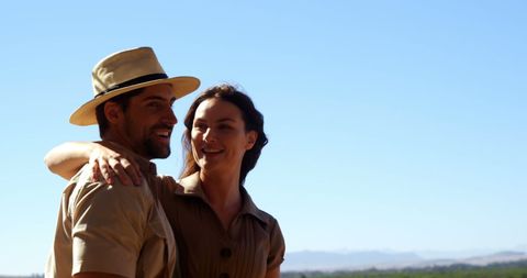 Smiling Couple Enjoying Safari Vacation Outdoors - Download Free Stock Images Pikwizard.com