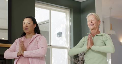 Diverse Senior Women Performing Yoga Poses at Home