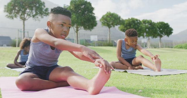 Kids Practicing Outdoor Yoga Stretches in Park - Download Free Stock Images Pikwizard.com