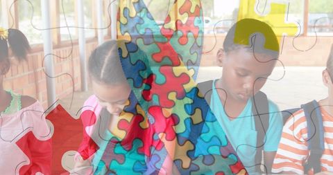 Children engaged with technology for autism awareness