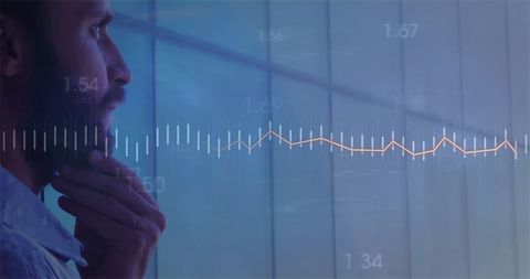 Analyzing data projections with thoughtful businessman