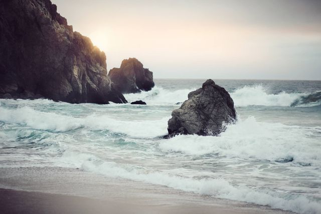 Dramatic Rocky Coastline with Crashing Waves at Sunset - Download Free Stock Photos Pikwizard.com