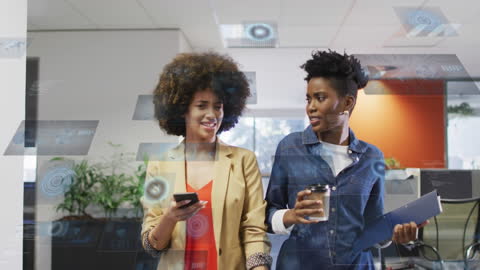 Colleagues Collaborating Amid Financial Data Displays