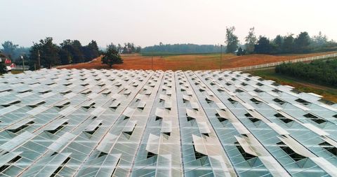 Aerial View of Vast Solar Farm in Rural Landscape - Download Free Stock Images Pikwizard.com