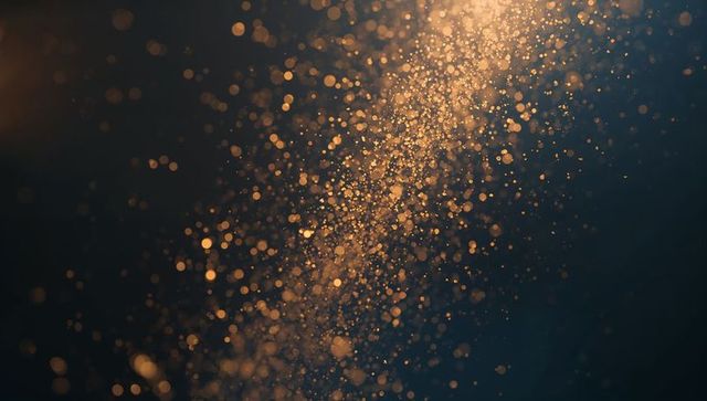 Streaming Golden Particles Cascading Across Dark Gradient