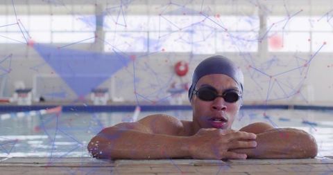 Focused Swimmer Resting Poolside with Technology Overlay