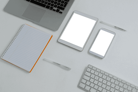 transparent office desk setup with devices and notepad - Download Free Stock Videos Pikwizard.com