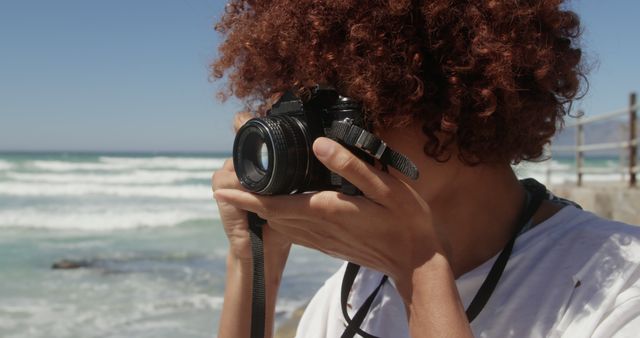 Young Woman Capturing Photos on Sunny Beach - Download Free Stock Images Pikwizard.com