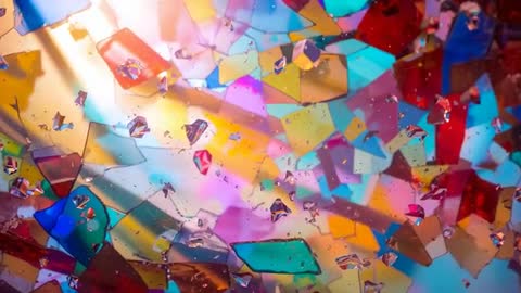 Shimmering Light Across Colorful Prismatic Shards Enhances Visual Vibrancy