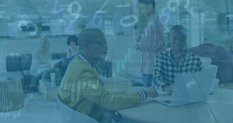 Diverse Business Team with Overlaid Financial Data Graphics