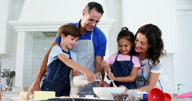 Happy Multiracial Family Baking Together in Bright Kitchen with Copy Space - Download Free Stock Images Pikwizard.com