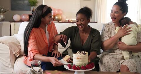 Multiracial Friends Celebrating Birthday with Cake and Baby