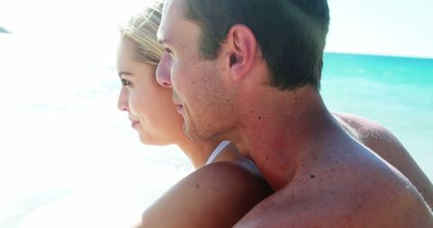 Happy Couple Enjoying Relaxation on Sandy Beach - Download Free Stock Images Pikwizard.com