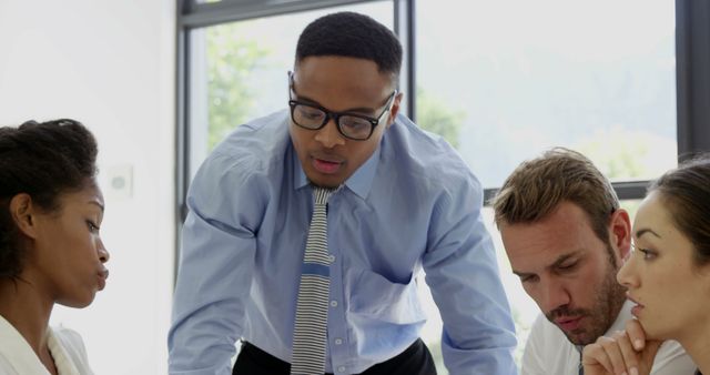 Diverse Team Collaborating During Business Meeting - Download Free Stock Images Pikwizard.com