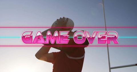 Game Over Text Overlay on Rugby Player Silhouette - Download Free Stock Images Pikwizard.com