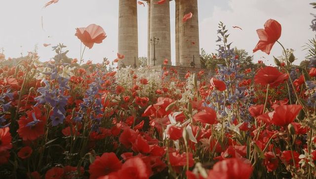 Tranquil meadow with vibrant poppies and majestic columns