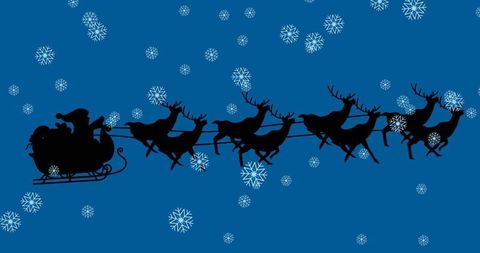 Silhouette of Santa on Reindeer-Pulled Sleigh in Snowy Night Sky