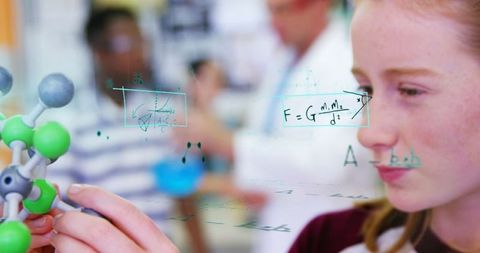 Student Engaged with Molecular Model in Classroom Exploration - Download Free Stock Images Pikwizard.com