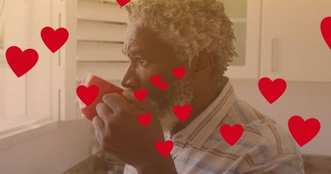 Relaxed Man Enjoying Morning Coffee Surrounded by Digital Hearts