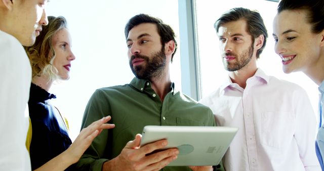 Team Collaborating in Bright Office Setting - Download Free Stock Images Pikwizard.com