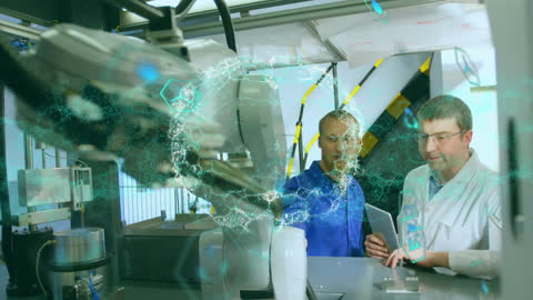 Engineers Collaborating with Advanced Robotics in Modern Laboratory