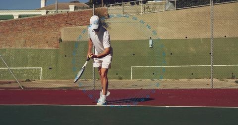Tennis Player on Court in Motion with Ball and Racket