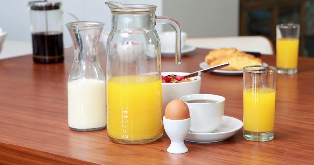 Healthy Breakfast with Orange Juice, Coffee, and Croissants on Wooden Table - Download Free Stock Images Pikwizard.com