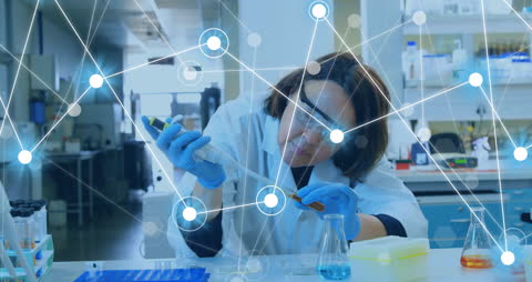 Female Scientist Analyzing Samples in Modern Laboratory