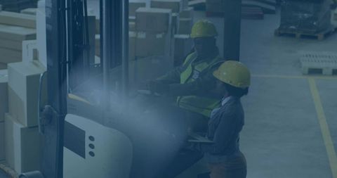 Forklift Operator and Supervisor Checking Inventory With Clipboard and Teamwork in Busy Warehouse