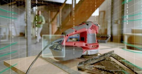 Carpenter walking through attic workshop with sander and binary data overlay