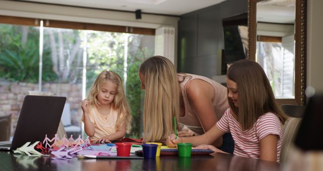 Mother Helping Daughters with Art and Crafts at Home - Download Free Stock Images Pikwizard.com