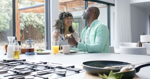 Diverse Mature Couple Enjoying Breakfast Together - Download Free Stock Images Pikwizard.com