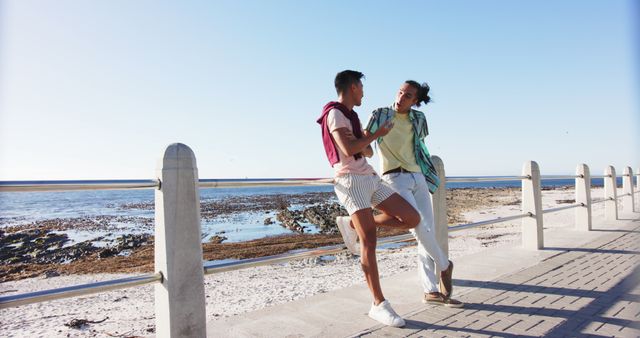 Young Couple Enjoying Sunny Day by the Beach - Download Free Stock Images Pikwizard.com