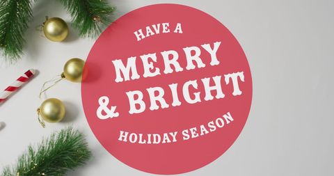 Festive Christmas Greetings with Gold Ornaments and Candy Cane Decoration