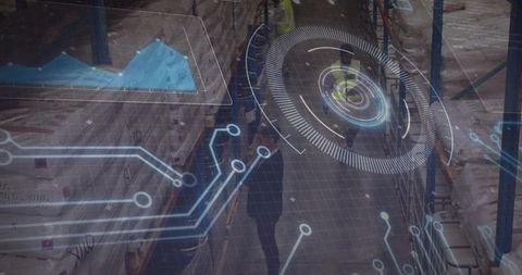 Worker inspecting stock with holographic technology in warehouse