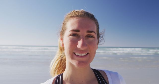 Smiling Woman on Sunny Seaside Beach - Download Free Stock Images Pikwizard.com