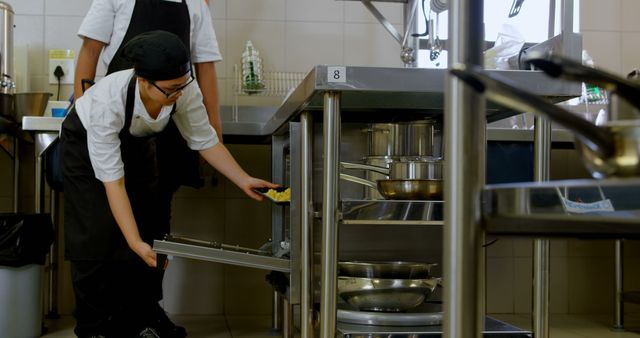 Culinary Students Cleaning Kitchen Equipment in Commercial Kitchen - Download Free Stock Images Pikwizard.com