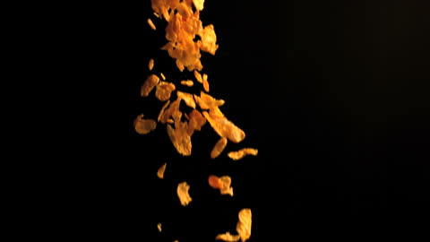 Golden Breakfast Cereal Crunches in Slow Motion