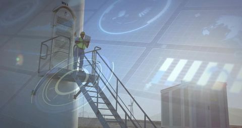 Technician using augmented reality at wind farm installation