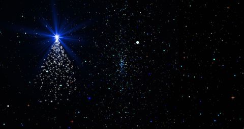 Christmas Tree Galaxy with Glittering Stars Over Dark Sky - Download Free Stock Images Pikwizard.com