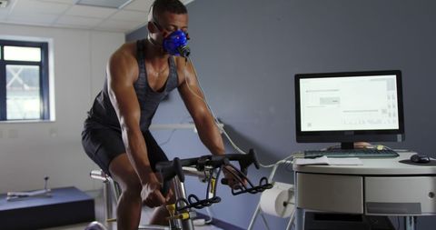Athlete using metabolic gas analyser for endurance training