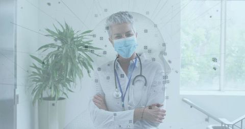 Confident Female Doctor Wearing Surgical Mask in Modern Clinic