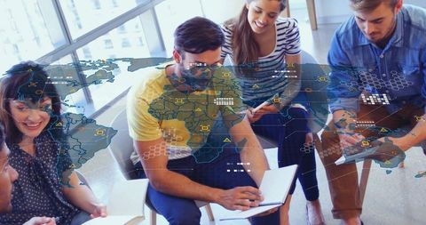 Team Collaborating Across Global Digital Map Data Overlay Meeting