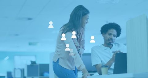 Diverse Coworkers Collaborating with Social Media Overlay