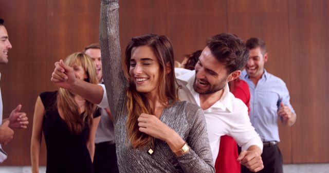 Group of Friends Happily Dancing at a Party Gathering - Download Free Stock Images Pikwizard.com