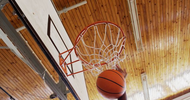 Basketball Scoring with Orange Ball in Indoor Court - Download Free Stock Images Pikwizard.com