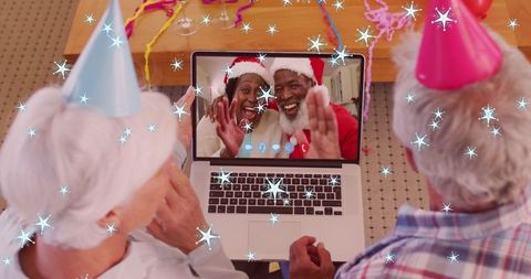 Senior Couple Video Calling on Christmas with Festive Decorations